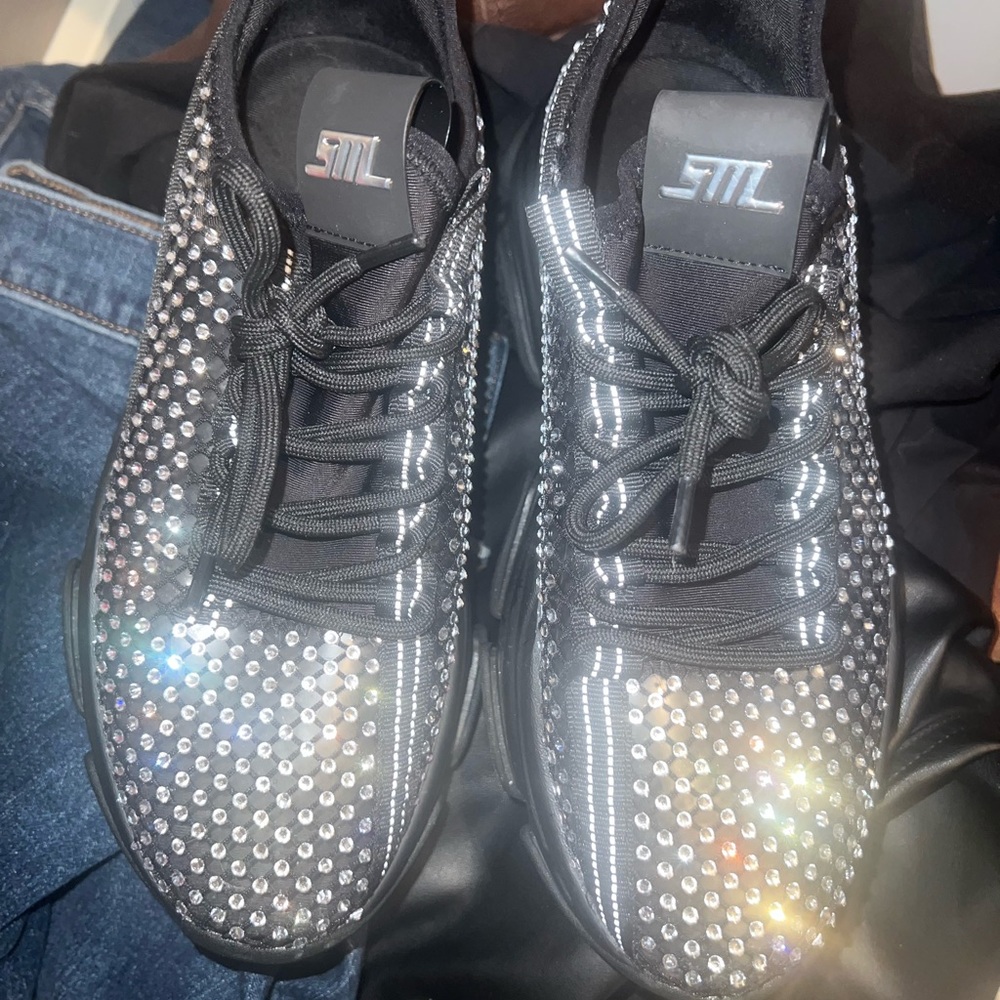 Black rhinestone see through sneakers.